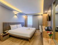 Postel nebo postele na pokoji v ubytování EViM HOTEL ÇORLU