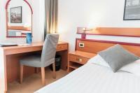 Posteľ alebo postele v izbe v ubytovaní Hotel Horizont