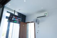 Ruby Mini Hotelにあるテレビまたはエンターテインメントセンター