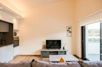 TV a/nebo společenská místnost v ubytování Can Cintet 3 Apartamento con terraza en Besalú