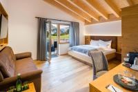 Posteľ alebo postele v izbe v ubytovaní Hotel Regnum Zegg