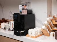 Příslušenství pro přípravu čaje a kávy v ubytování Atour Hotel Shenzhen Nanshan West Lizhi Valley Industrial Park