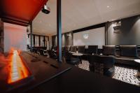 a conference room with a long table and chairs at Lakeside Retreat - LuguLake Lijiang in Zuosuo