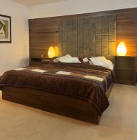 Posteľ alebo postele v izbe v ubytovaní Hotel Barbakan