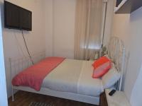 A bed or beds in a room at Acogedoras Habitaciónes en Madrid