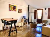 A seating area at Apartamentos Ilíberis