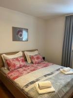 Postel nebo postele na pokoji v ubytování Apartman B&B