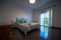 Postel nebo postele na pokoji v ubytování Casa rural Granada Los Corralillos de Pepa