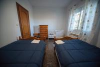 Postel nebo postele na pokoji v ubytování Casa rural Granada Los Corralillos de Pepa