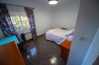 Postel nebo postele na pokoji v ubytování Casa rural Granada Los Corralillos de Pepa