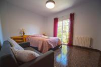 Postel nebo postele na pokoji v ubytování Casa rural Granada Los Corralillos de Pepa