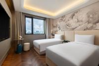 Blossom House Shanghai On The Bundにあるベッド