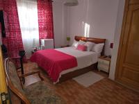 A bed or beds in a room at Acogedoras Habitaciónes en Madrid