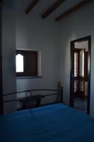 A bed or beds in a room at Casa Francesca