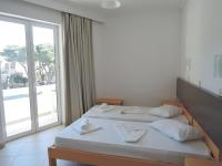 Postel nebo postele na pokoji v ubytování Fantasia Hotel Apartments