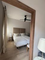 Postel nebo postele na pokoji v ubytování Apartamentos Las Vegas