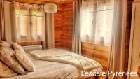 Posteľ alebo postele v izbe v ubytovaní Vue imprenable et jacuzzi 4 Etoiles
