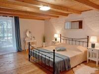 Łóżko lub łóżka w pokoju w obiekcie Holiday house Franko