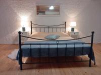 Łóżko lub łóżka w pokoju w obiekcie Holiday house Franko