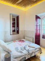 Postel nebo postele na pokoji v ubytování Casa Jardín El Colmenar