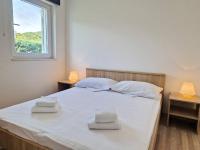 Posteľ alebo postele v izbe v ubytovaní Apartment Pavlakovic