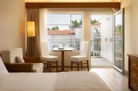 Posteľ alebo postele v izbe v ubytovaní Mitsis Alexander the Great Hotel