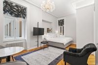 Postel nebo postele na pokoji v ubytování Vodickova Luxury Suites