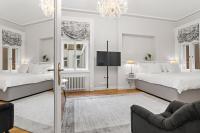 Postel nebo postele na pokoji v ubytování Vodickova Luxury Suites