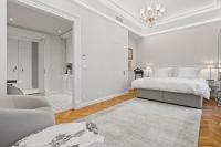 Postel nebo postele na pokoji v ubytování Vodickova Luxury Suites