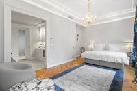 Postel nebo postele na pokoji v ubytování Vodickova Luxury Suites