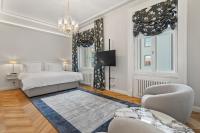 Postel nebo postele na pokoji v ubytování Vodickova Luxury Suites