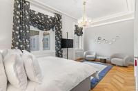 Postel nebo postele na pokoji v ubytování Vodickova Luxury Suites