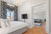 Postel nebo postele na pokoji v ubytování Vodickova Luxury Suites