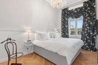 Postel nebo postele na pokoji v ubytování Vodickova Luxury Suites