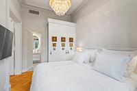 Postel nebo postele na pokoji v ubytování Vodickova Luxury Suites