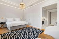 Postel nebo postele na pokoji v ubytování Vodickova Luxury Suites