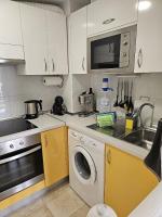 Kuchyň nebo kuchyňský kout v ubytování Apartament CALETA