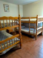 Albergue Turístico Brizにあるベッド