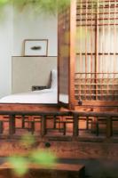 Ein Bett oder Betten in einem Zimmer der Unterkunft Nostalgia Hanok Hotel