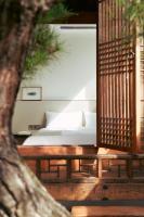 Ein Bett oder Betten in einem Zimmer der Unterkunft Nostalgia Hanok Hotel