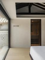Ein Bett oder Betten in einem Zimmer der Unterkunft Nostalgia Hanok Hotel