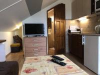 Kuchyňa alebo kuchynka v ubytovaní APARTAMENTY-STUDIO noclegi wczasy wakacje ferie - pobyty rodzinne