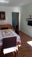Televízia a/alebo spoločenská miestnosť v ubytovaní apartmani vraničić