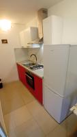 Kuchyňa alebo kuchynka v ubytovaní apartmani vraničić