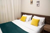 Postel nebo postele na pokoji v ubytování Al Dora Boutique hotel