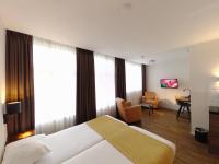 Een TV en/of entertainmentcenter bij Hotel Residence Le Coin
