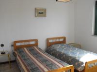 A bed or beds in a room at Borgo Le Logge