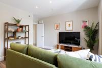 TV a/nebo společenská místnost v ubytování Wellington Place I Your Apartment