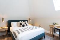 Postel nebo postele na pokoji v ubytování Wellington Place I Your Apartment