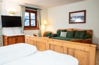 Łóżko lub łóżka w pokoju w obiekcie Hotel-Gasthof Weitgasser